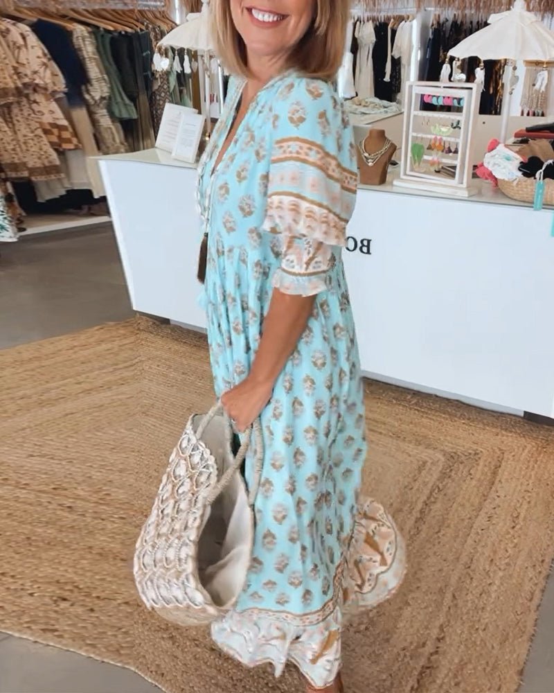 MANA | MIDI DRESS WITH FLORAL PATTERNS AND V-NECK