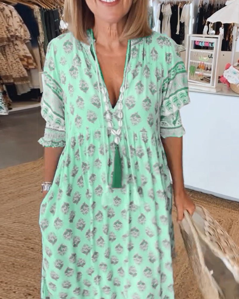 MANA | MIDI DRESS WITH FLORAL PATTERNS AND V-NECK