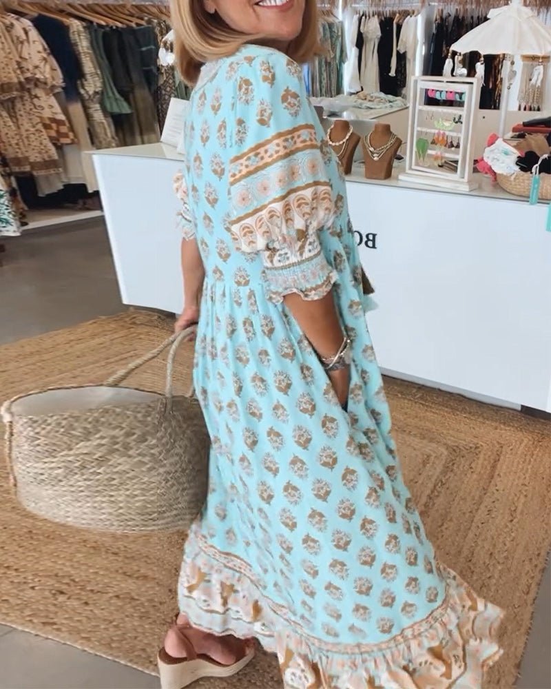 MANA | MIDI DRESS WITH FLORAL PATTERNS AND V-NECK