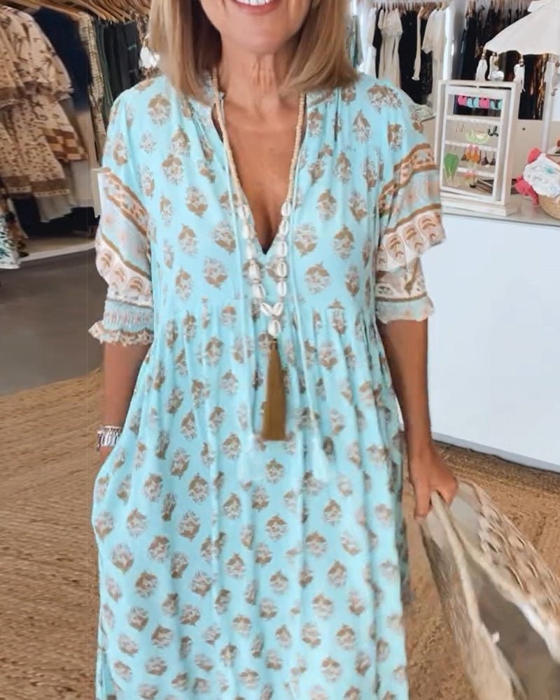 MANA | MIDI DRESS WITH FLORAL PATTERNS AND V-NECK